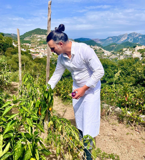 Chef picking fresh ingredients in the garden for a farm to table Chef’s Table experience on the Amalfi Coast